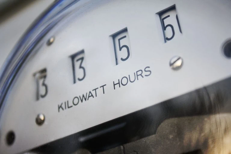 Power meter showing kilowatt hours